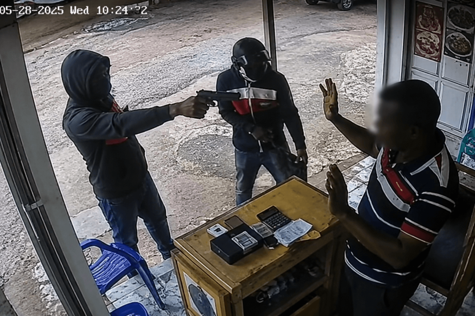 Watch: Armed Robbers Caught on CCTV Attacking Gold Buyer at Mporhor