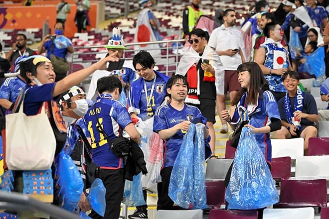 Watch: Japanese Fans Win Global Praise for Cleaning Stadium After Netherlands Clash
