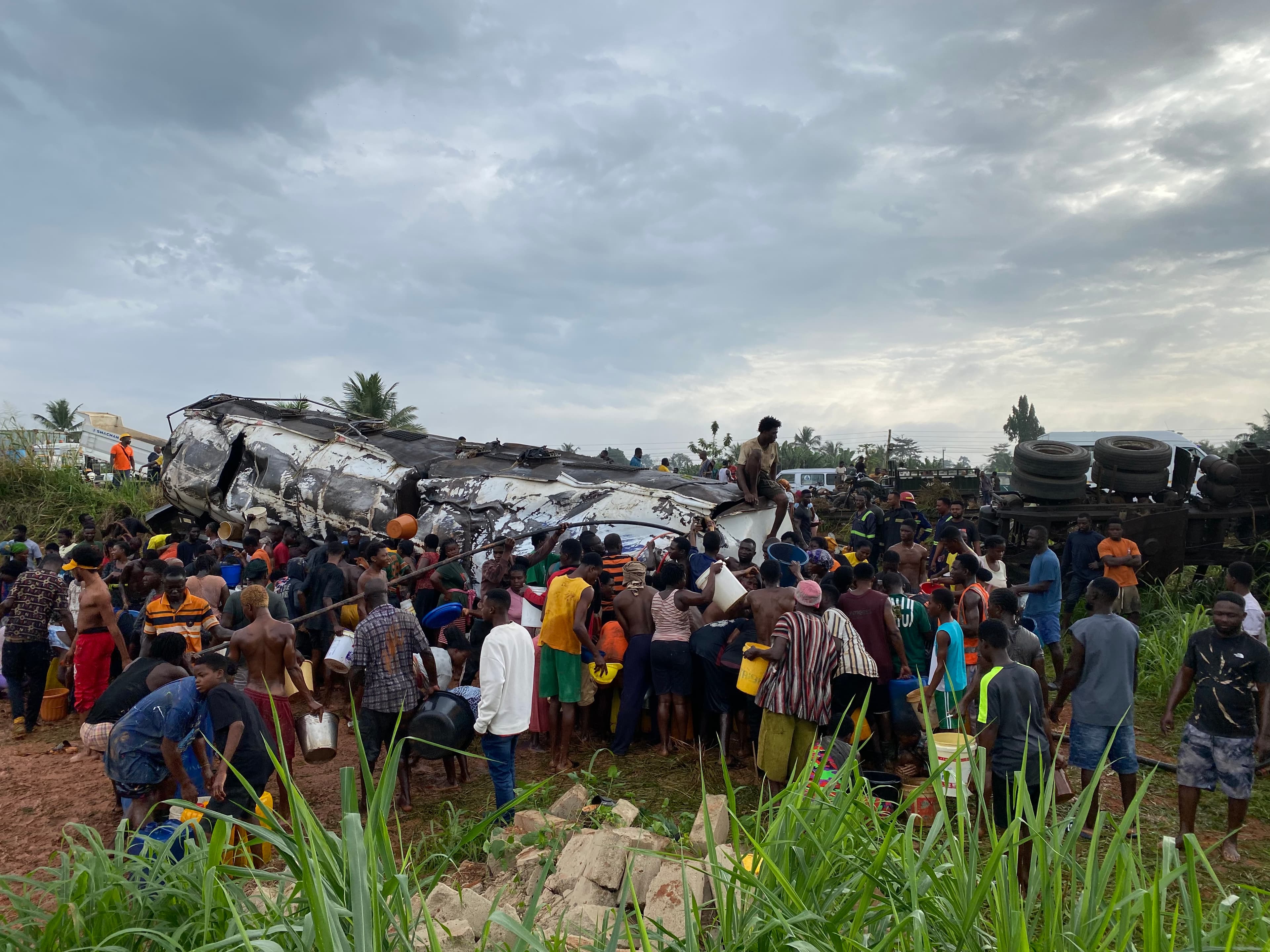 Fuel Tanker Overturns on Accra–Kumasi Highway as Residents Rush to Scoop Fuel at Densuso